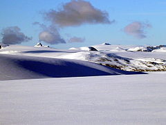 Lodalskåpa (in the left) seen from Myklebustbreen in the west.