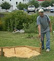 Shawn Coley prepares to toss horseshoe at the 2008 Our Community Place Lawn Jam in Harrisonburg, Virginia.