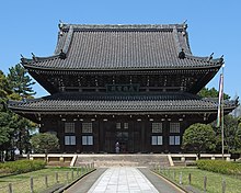 Two story pagoda in dark wood