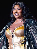 A picture of American singer Lizzo in a corset