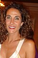 Melina Kanakaredes interpreta Stella Bonasera