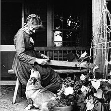 Tasha Tudor shaving splints from a log on her Vermont farm in 1977