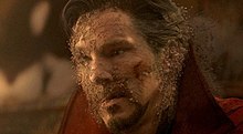 Doctor Strange dusting away after Thanos collected all of the Infinity Stones and snapped his fingers, wiping out half of all living life in the universe.