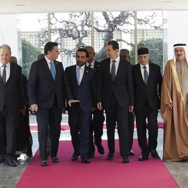 Syrian President Bashar al-Assad, third right, meets with a delegation representing various Arab parliaments in Damascus.