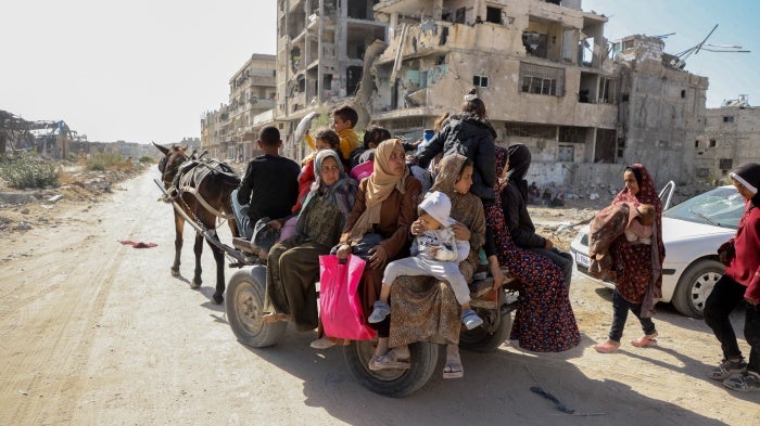 Displaced Palestinians flee after an evacuation order by the Israeli military in Jabalia in the northern Gaza Strip on October 23, 2024. 