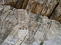 Inscription gravée sur la roche près du pont romain