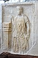 English: Stone relief of a female offering servant Deutsch: Grabbaurelief mit Darstellung einer Opferdienerin