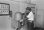 Thumbnail for File:Negro drinking at "Colored" water cooler in streetcar terminal, Oklahoma City, Oklahoma by Russell Lee.jpg