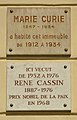 Plaques Marie Curie and René Cassin at Quai de Béthune in 4th district of Paris