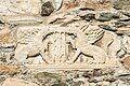 English: Relief of a tripod, flanked by griffins (CSIR II/4, 390), at the southern wall Deutsch: Relief von einem Dreifuß, flankiert von Greifen (CSIR II/4, 390), an der S-Wand