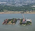 Seen from east. From left to right: contagious diseases ward; lawn; hospital; ferry basin; main building, kitchen, dormitory, and immigration building