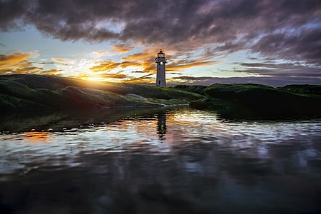 Perch Rock Lighthouse in rock pool