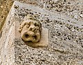 English: Head sculpture of a demon at the northern wall Deutsch: Dämonenkopf aus Stein an der N-Wand