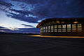 "Spaceport_America_terminal_hangar_at_night_(14907530348).jpg" by User:Varnent