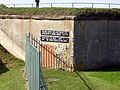 There near this wall nazis shot and burned people in 1943-1944.