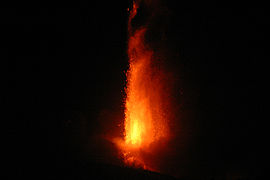 Mount Etna in 2007, generating a glowing fountain of molten lava.