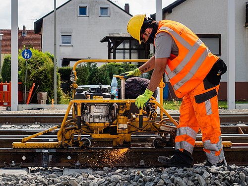 Track grinding machine at work