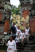 Women carrying offerings