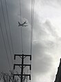 Plane flying into clouds