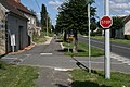 Small stop sign on a bike path in France