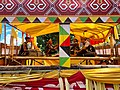 Dayaknese men preparing to play traditional music on a ship in Gawai Mamandung Event