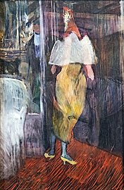   Femme en toilette de bal à l'entrée d'une loge de théâtre