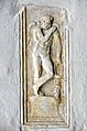 English: Roman gravestone relief showing a mourning genius Deutsch: Römisches Grabbaurelief mit Darstellung eines Trauergenius