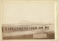 Company "C," 3rd U.S. Infantry, caught on the fly, near Fort Meade. Bear Butte in the distance (1890, LC-DIG-ppmsc-02560)