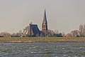 Gereformeerde kerk van Andijk. Zicht vanaf de MS Friesland.