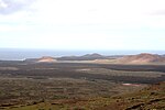 Thumbnail for File:Yaiza - LZ-704+Montaña Bermeja+Montaña del Golfo+Montaña de la Vieja Gabriela (La Degollada) 01 ies.jpg