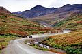 Truck winding through the Richardson Mountains in NWT