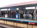 A brown line train at Fullerton station