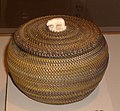 Inuit basket made by Kinguktuk (1871-1941) of Barrow, Alaska. Ivory handle.