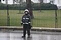 A Uniformed U.S. Secret Service agent stands guard in riot gear outside the White House in Washington, D.C.