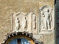 English: Roman gravestone with the relief of a standing couple (CSIR II/3, 289) and block of Roman gravestone with the relief of a warrior (CSIR II/4, 296) Deutsch: Römerzeitliche Grabreliefplatte mit zwei frontal stehenden Figuren eines Ehepaares (CSIR II/3, 289) und Eckblock von einem römischen Grabbau mit Relieffigur eines waffentragenden Jünglings (CSIR II/4, 296)