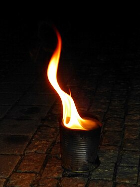 Artificial flame from a can with burning paste