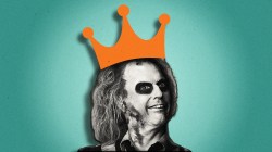 Michael Keaton as Beetlejuice in the film "Beetlejuice Beetlejuice" wearing a crown