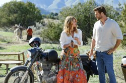 Lonely Planet. (L-R) Laura Dern as Katherine Loewe and Liam Hemsworth as Owen Brophy in Lonely Planet. Cr. Anne Marie Fox/Netflix © 2024