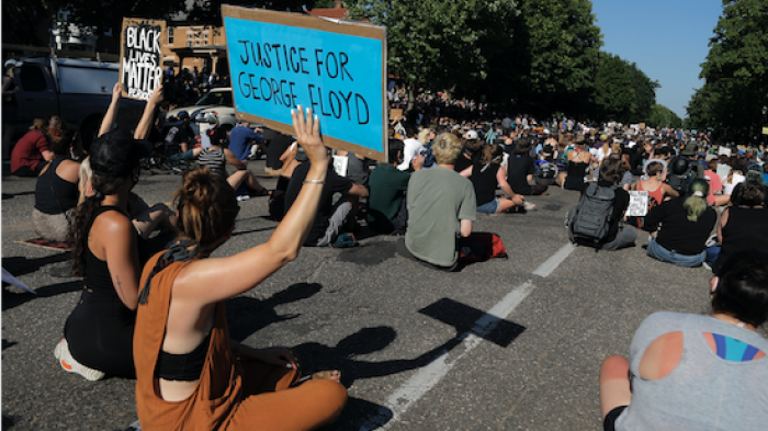 Demonstrators gather at the Minnesota governor's mansion Monday, June 1, 2020, in St. Paul, Minn. Protests continued following the death of George Floyd, who died after being restrained by Minneapolis police officers on Memorial Day. 