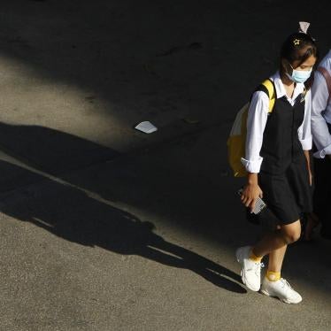 Cambodian school girls walk home at the end of their school day outside Phnom Penh, Cambodia.