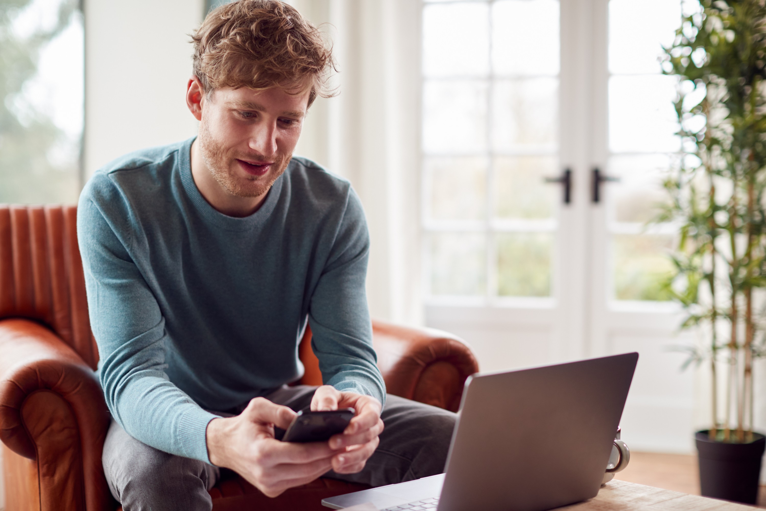 A man looks at his investment returns