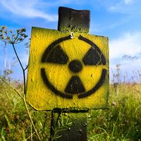 Symbol radiation on grass background