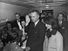 Jacqueline Kennedy and Lady Bird Johnson stand by President Lyndon B. Johnson as he takes the oath of office aboard Air Force One after the assassination of John F. Kennedy, November 22, 1963.