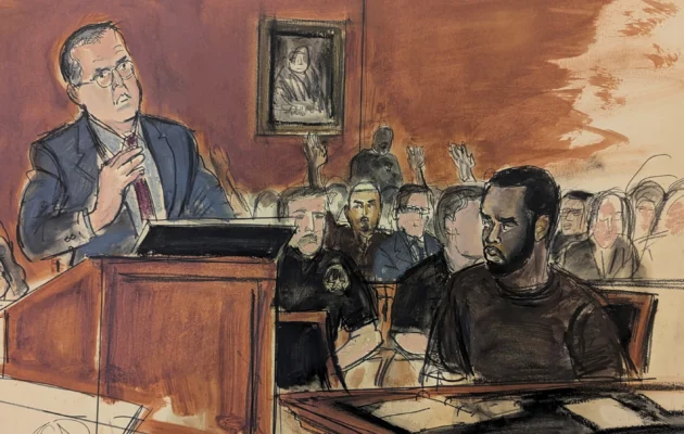 In this courtroom sketch, Sean Combs (R) looks at his attorney Marc Agnifilo (L) as he delivers his bail argument as Combs's family in the gallery, background, raise their hands indicating to Judge Tarnofsky that they are in attendance, to bolster the defense attorney's bail argument, in Manhattan Federal Court in New York on Sept. 17, 2024. (Elizabeth Williams via AP)