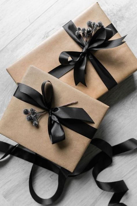 A simple, elegant way to gift wrap your Christmas presents with parcel paper and black satin ribbon #giftwrapideas #giftwrapchristmas #giftwrappingideas #giftwrappingideasforchristmas #elegantwrappingideas #blackribbonpresent Gifts, Gift Wrapping, Black, Christmas, Brown Paper, Black Ribbon, Christmas Presents, Style Inspiration