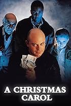 Ray Fearon, Ross Kemp, Warren Mitchell, and Ben Inigo Jones in A Christmas Carol (2000)