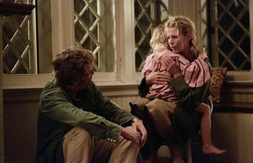 Kim Basinger, Jeff Bridges, and Elle Fanning in The Door in the Floor (2004)