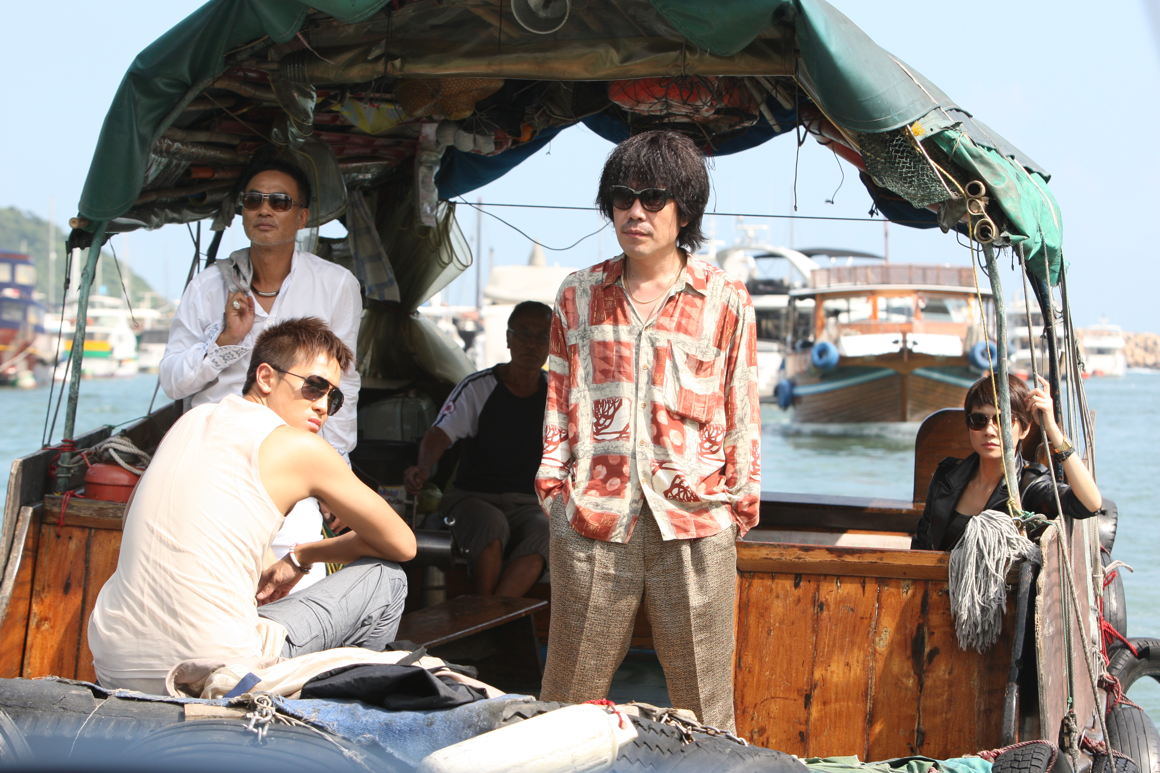 Angelica Lee, Simon Yam, Derek Tsang, and Oh Dal-su in Đội Quân Siêu Trộm (2012)