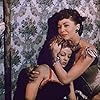 Jacqueline Fontaine and Marie Windsor in Outlaw Women (1952)