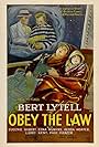 Bert Lytell, Edna Murphy, and Paul Panzer in Obey the Law (1926)